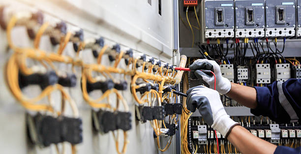 Professional Electrician technician working in Moore County County, TX